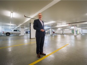 Ross Moore, senior vice-president at Cresa Vancouver, in a near empty underground parking lot in Vancouver.