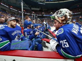 VANCOUVER, BC - OCTOBER 10:  Jacob Markstrom #25 of the Vancouver Canucks talks to teammate Anders Nilsson #31 during their NHL game against the Ottawa Senators at Rogers Arena October 10, 2017 in Vancouver, British Columbia, Canada.  (Photo by Jeff Vinnick/NHLI via Getty Images)"n ORG XMIT: 775040609 [PNG Merlin Archive]

Not Released