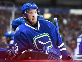 Alex Biega at the Canucks' bench in Feb. 2016.