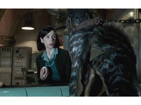 Sally Hawkins and Doug Jones (under that monster outfit) are seen in Guillermo del Toro's new film, The Shape of Water.