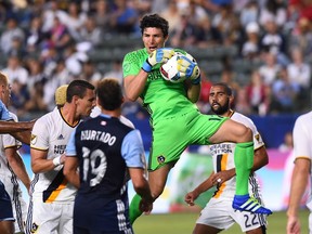 Los Angeles Galaxy goalkeeper Brian Rowe makes a save in the first half of a 2016 game against the Vancouver Whitecaps at StubHub Center.