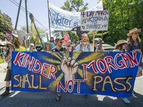 Hundreds of activists rally to finish a 75 kilometre march at the gates of Kinder Morgan during an Anti-Pipeline walk in Burnaby in May, 2017.