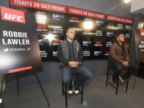 Robbie Lawler, left, and Rafael dos Anjos face off this weekend in Winnipeg.