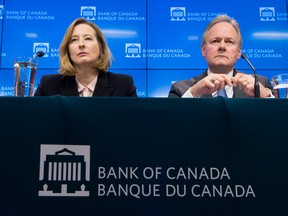 Bank of Canada Senior Deputy Governor Carolyn Wilkins and Bank of Canada Governor Stephen Poloz listen to a question during a news conference in Ottawa, Wednesday January 17, 2018.