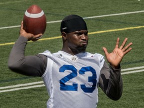 Then-Montreal Alouettes running back Brandon Rutley tosses the ball around during a team practice in Saint-Leonard, Que., in August 2016.