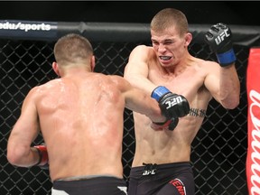 Surrey MMA fighter Jeremy Kennedy (right) trades punches with Kyle Bochniak during their UFC Fight Night featherweight bout at the Nassau Veterans Memorial Coliseum in Uniondale, New York, on July 22, 2017.