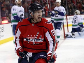 Evgeny Kuznetsov of the Capitals celebrates after scoring a second period goal against the Canucks.