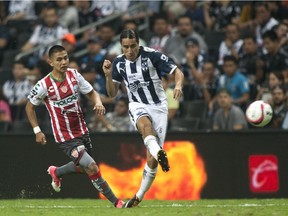 Efrain Juarez (right) in action for Monterrey against Necaxa during the Mexican Apertura tournament in Monterrey, Mexico, on Sept. 9, 2017. Juarez is with the Vancouver Whitecaps on a two-year contract. (Photo: Julio Cesar Aguilar, AFP/Getty Images files)