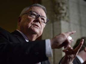 Minister of Public Safety and Emergency Preparedness Ralph Goodale speaks to reporters in the foyer of the House of Commons on Parliament Hill on Friday, March 10, 2017 in Ottawa.