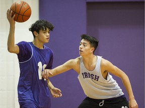Vancouver College basketball star Jack Cruz-Dumont (right) defends against a teammate during a Vancouver College practice session.