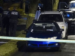 Vancouver police investigate a body found in a parked car at Euclid and Fairmont, Vancouver, January 18 2018.