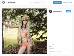 In this screenshot, Stephanie Katelnikoff poses in a bikini and fur hat in the woods in a post to her Instagram account.