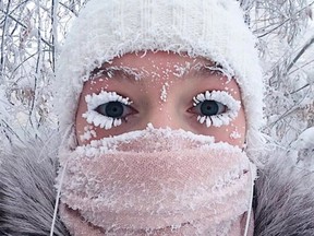 Anastasia Gruzdeva poses on Sunday, Jan. 14, 2018, for a selfie as the temperature drops to about -50C in Yakutsk, Russia.