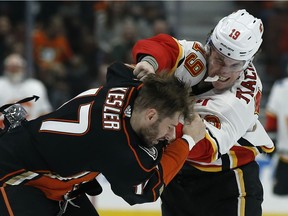 Ryan Kesler mixes it up with Matthew Tkachuk in one of his many bouts this season.