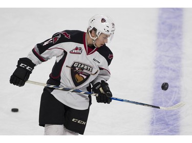 Vancouver Giants #14 James Malm bounces the puck off his stick during the pregame skate prior to playing the Portland Winterhawks in a regular season WHL hockey game at LEC, Vancouver, January 20 2018.