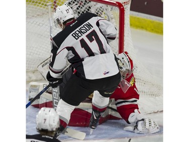 Vancouver Giants #17 Tyler Benson moves in tight on Portland Winterhawks goalie Shane Farkas in the first period of a regular season WHL hockey game at LEC, Vancouver, January 20 2018.