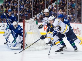 Jack Eichel works his way around defenders during the Sabres' 4-0 win.