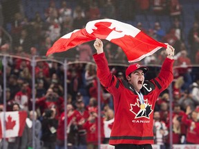 Canada forward Dillon Dube (9) reacts after winning the gold medal against Sweden in gold medal final IIHF World Junior Championships hockey action in Buffalo, N.Y., on Friday, January 5, 2018.