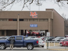 Emergency crews respond to Marshall County High School after a fatal school shooting Tuesday, Jan. 23, 2018, in Benton, Ky. Authorities said a shooting suspect was in custody.