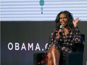 Former first lady Obama responds to a question from poet Elizabeth Alexander during the second day of the Obama Foundation Summit in Chicago on Wednesday, Nov. 1, 2017.