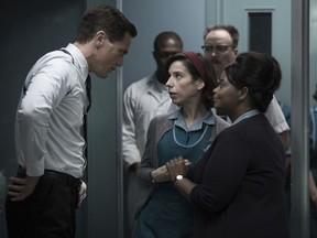 This image released by Fox Searchlight Pictures shows Michael Shannon, from left, Sally Hawkins and Octavia Spencer in a scene from the film, "The Shape of Water." Guillermo del Toro's Cold War fantasy tale will vie for the most nominations for the 90th annual Academy Awards. (Fox Searchlight Pictures via AP) ORG XMIT: NYET503