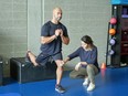 Stefania Rizzo (right), director of physiotherapy at Fortius Sport & Health, works with client Fraser Aitcheson, a stunt performer and actor who tore both of his quads shooting a stunt scene.