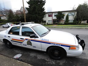 Burnaby RCMP on the scene of a homicide in a ground floor apartment at 6508 Telford Ave. on Wednesday, Jan. 3, 2018.