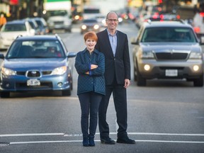 Mobility Pricing Independent Commission members Joy MacPhail and Allan Seckel in traffic at Vancouver on Monday.