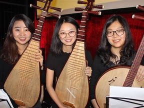 Juliana Zhang, Feiwen Zhou and KunpengYang, members of UBC's Chinese Music Ensemble, performed at UBC's 10th Lunar New Year Dinner, which ushered in the Year of the Dog.