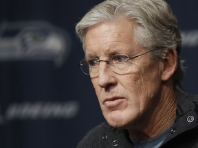 Seattle Seahawks NFL football head coach Pete Carroll listens to a question as he talks to reporters, Tuesday, Jan. 2, 2018, during his end-of-season press conference, in Renton, Wash.