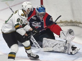 Windsor Spitfire goalie Michael DiPietro makes a save on Alex Formenton of the London Knights during their game on Thursday, January 18, 2018 at the WFCU Centre in Windsor, ON.