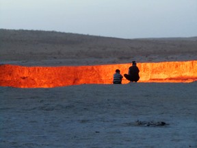 Fjola Helgadottir and her husband at a gas crater in the middle of the Karakum desert.
