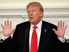 U.S. President Donald Trump speaks during a business session with state governors in the State Dining Room of the White House in Washington, D.C., U.S., on Monday, Feb. 26, 2018.