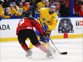Rasmus Dahlin of Sweden takes a shot in the 2018 world junior gold-medal game against Canada on Jan. 5, 2018.