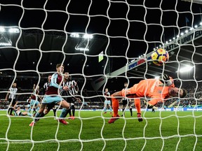 Newcastle goalkeeper Karl Darlow is beaten by a Sam Vokes header (not pictured) for the Burnley goal during the Premier League match between Newcastle United and Burnley at St. James Park on January 31, 2018 in Newcastle upon Tyne, England.