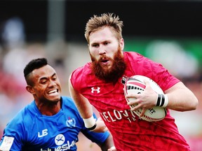 Luke Bradley of Canada makes a break against Samoa during the 2018 New Zealand Sevens at FMG Stadium on February 3, 2018 in Hamilton, New Zealand.