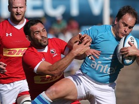 Uruguay captain Juan Manuel Gaminara is tackled by Canada captain Phil Mack during their Rugby World Cup 2019 qualifier Montevideo, Uruguay.