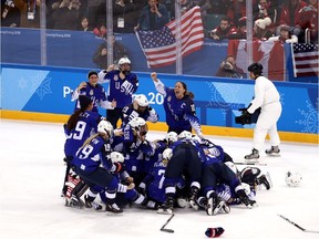 The United States celebrates after defeating Canada in a shootout to win the Women's Gold Medal Game on day thirteen of the PyeongChang 2018 Winter Olympic Games at Gangneung Hockey Centre.