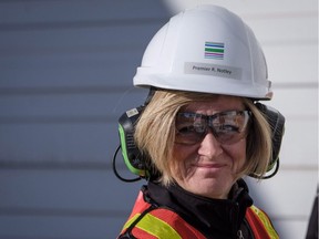 B.C. can expect more get-tough actions from Alberta, Premier Rachel Notley (seen touring a pipe, casing and tubing plant) tells The Province's Mike Smyth.