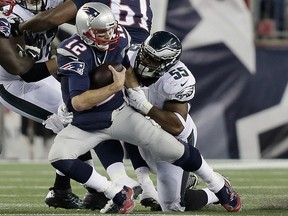 In this Dec. 6, 2015, file photo, Philadelphia Eagles linebacker Brandon Graham (55) sacks New England Patriots quarterback Tom Brady (12) in Foxborough, Mass. (AP Photo/Charles Krupa, File)