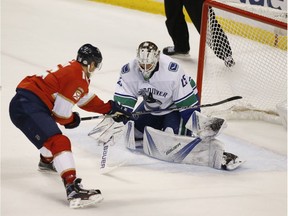 Florida Panthers center Aleksander Barkov scores against Canucks goalie Jacob Markstrom last week.