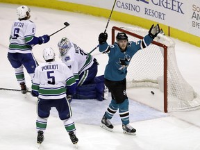 Chris Tierney, one of the so-called worker bees on the San Jose Sharks, celebrates after scoring Thursday against the Vancouver Canucks. The Sharks chomped on the Canucks 4-1 at the SAP Center in San Jose, Calif.