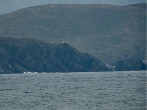 The notorious Cape Horn is usually shrouded in fog, mist and clouds and beaten with winds and waves. It's at the tip of South America, separated from Antarctica by the notoriously rough Drake Passage.