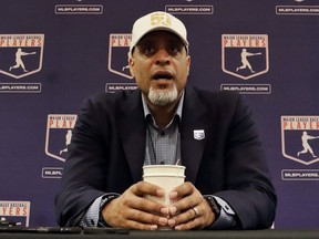 In this Feb. 19, 2017, file photo, Tony Clark, executive director of the Major League Players Association, answers questions at a news conference in Phoenix.