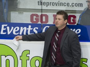 Vancouver Giants head coach Jason McKee behind the bench during a Western Hockey League game against the Kelowna Rockets at the Langley Events Centre in February 2017.