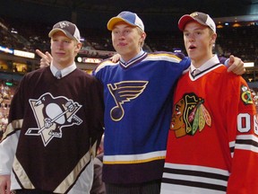 Pittsburgh's Jordan Staal (picked 2nd), Erik Johnson (picked 1st) and Jonathan Toews (picked 3rd)  pose at the 2006 NHL Entry Draft in Vancouver.