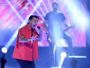 Hedley performs during WE Day Toronto celebrations on Thursday Sept. 28, 2017. Corus Radio says it has temporarily suspended all airplay of Hedley across its music stations as the Canadian rockers face allegations of sexual misconduct.