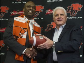 Wally Buono, the head coach, icon and vice-president of the B.C. Lions, says new general manager Ed Hervey, left, is the boss of the CFL team and the team will "do things Ed's way" this season as requested by team owner David Braley.