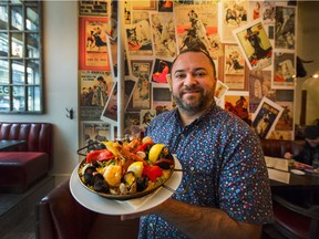 Executive chef/owner his paella.