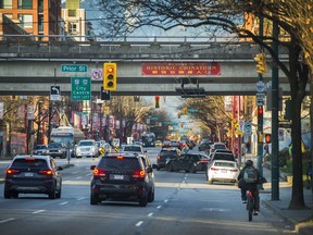 A welcome to Chinatown sign hangs on the side of the Georgia Viaduct. The future of the area underneath the viaducts is included in the Northeast False Creek plan, which the city is voting on Tuesday.